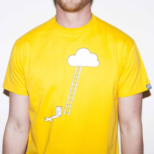 Yellow T-shirt with a funny computer nerd cloud storage geek joke screen printed in white on the front. A small hard disk drive with crucifix shadow stands at the foot of ladder with could at the top. 